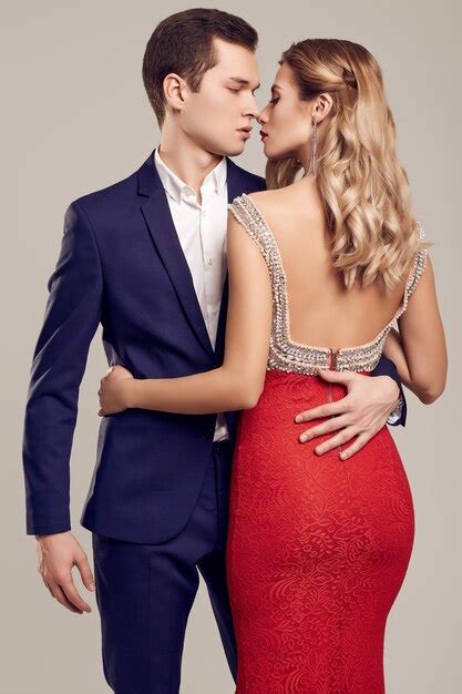 Premium Photo Sensual Beautiful Young Couple Dressed In Formal Clothes