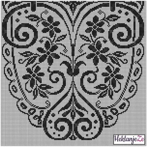 A Cross Stitch Pattern With Black And White Designs