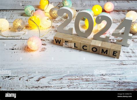 Welcome 2024 Word Alphabet Letters On Wooden Background Stock Photo Alamy