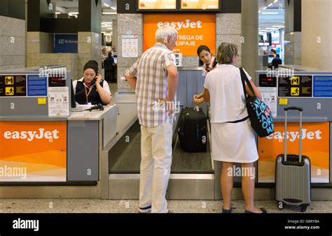 Airport Luggage Check In Passengers At The Easyjet Baggage Drop Palma