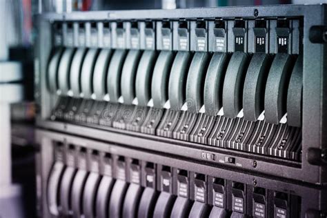 Cluster Of Data Storage Ssd Hard Drives Inside Server Rack Stock Photo