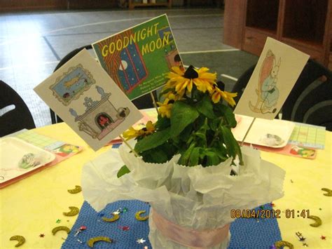 A Vase Filled With Sunflowers Sitting On Top Of A Yellow Tablecloth