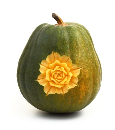 Premium Photo | Beautifully carved flower on pumpkin isolated on white