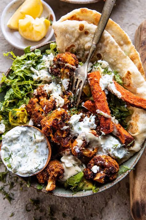 Crispy Cauliflower Tzatziki Bowls with Sweet Potato Fries