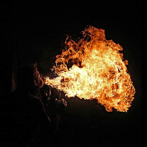 Man Breathing Fire Stock Photos Pictures And Royalty Free Images Istock