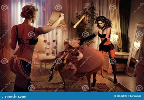 Two Sensual Young Ladies Fighting In The Hotel`s Apartment Stock Image