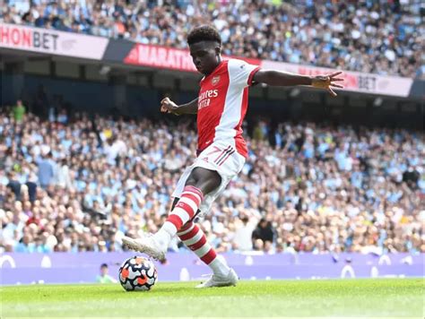 Poster Print Of Bukayo Saka Faces Off Against Manchester City