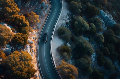 Premium Photo Aerial View Of Car Driving Down Road