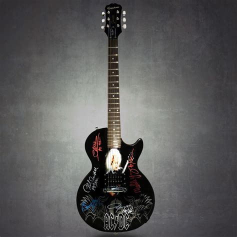 √ Ac Dc Autographed Guitar