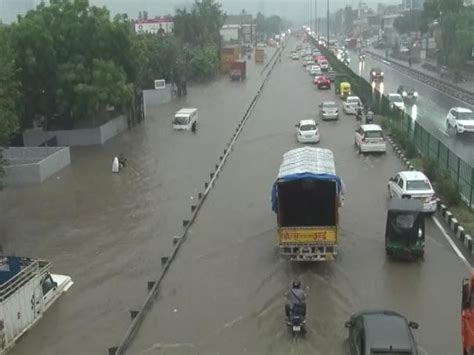 Video Gurugram Waterlogging Forces People To Wade Through Knee Deep Water