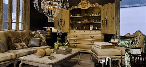 A Living Room Filled With Furniture And A Chandelier