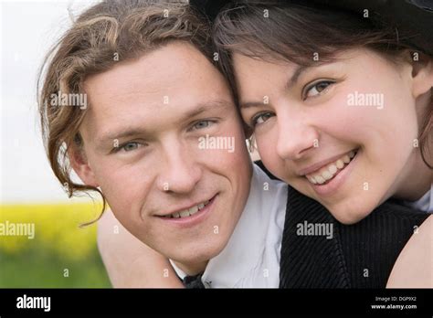 Young Woman Embracing Her Partner Stock Photo Alamy