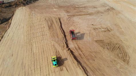 Drone View Of Bulldozers Excavators And Dump Trucks Involved In