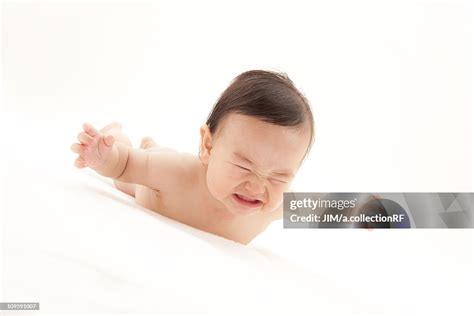 Baby Boy Grimacing High Res Stock Photo Getty Images