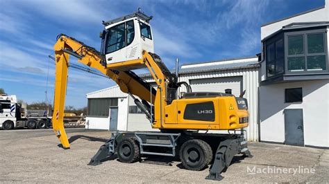 Koparka przeładunkowa LIEBHERR LH 30 na sprzedaż Niemcy Warburg