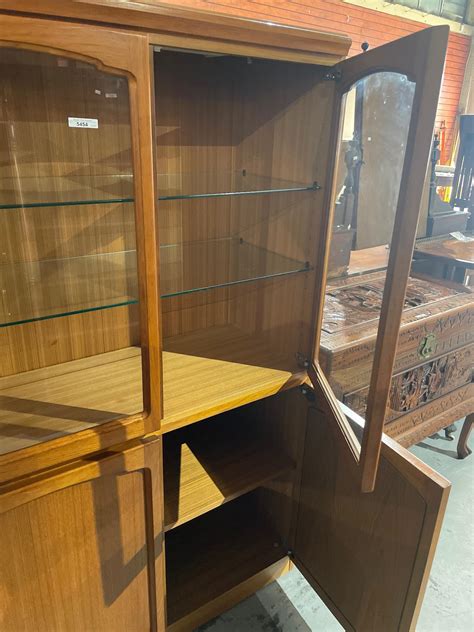 Sold Price Vintage Teak Display Cabinet In The Parker Chiswell Style Two Upper Glazed Doors