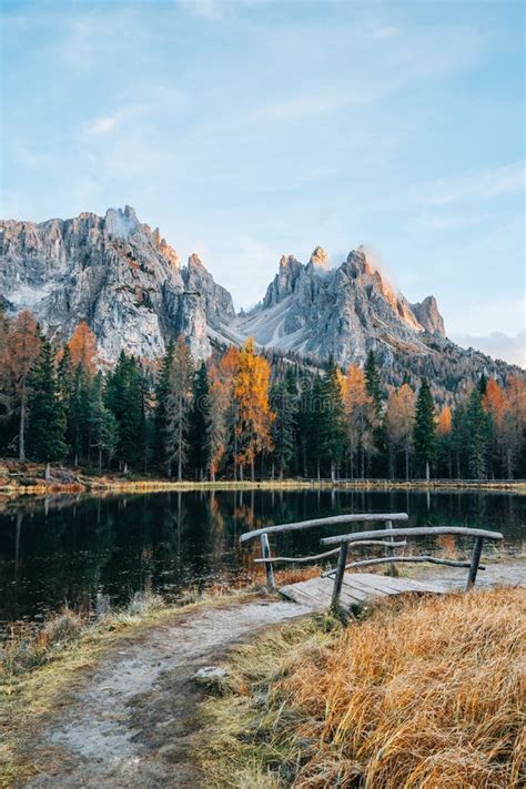 Autumn Colours Of Lake Lago D Antorno And Bridge In Dolomites Italy