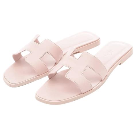 Hermès Hermes Oran Flache Sandalen Damen Leder Rosa Pink ref 512302