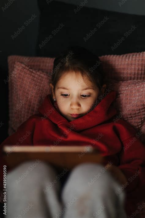 Little Girl Reading Stock Photo | Adobe Stock