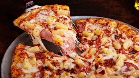 You've Heard Of Pineapple On Pizza, But What About Pizza On Pineapple?