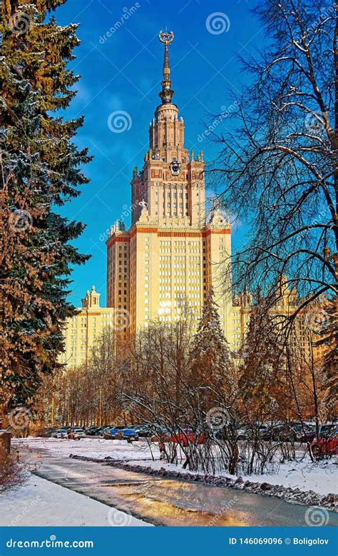 Vibrant Sunny View of Winter Campus of Famous Russian University with Snowed Evergreen Trees ...