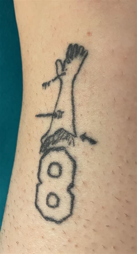 Kobe Bryant’s arm from his autopsy and his OG number. : r/shittytattoos