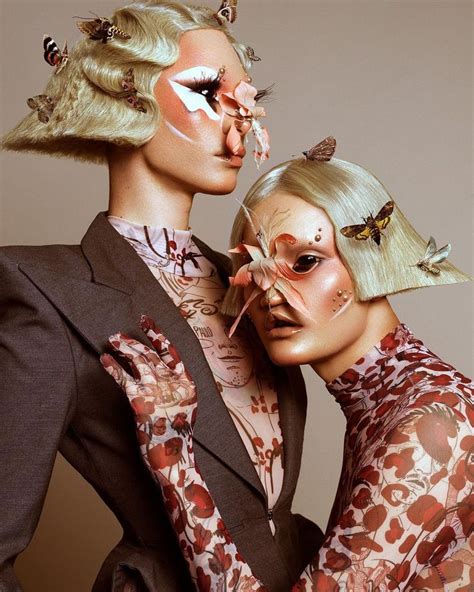 Two Women With Makeup On Their Faces Are Posing For The Camera One Is