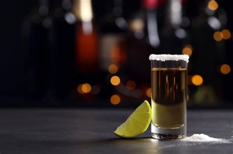 Premium Photo Mexican Tequila Shot With Lime And Salt On Bar Counter