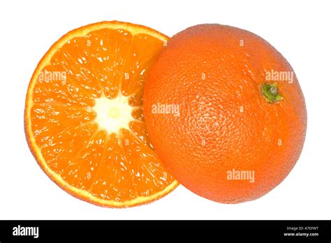 Ripe Juicy Orange Cut In Half And Isolated On White Stock Photo Alamy