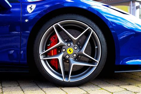 Wheel of a Blue Shiny Car · Free Stock Photo