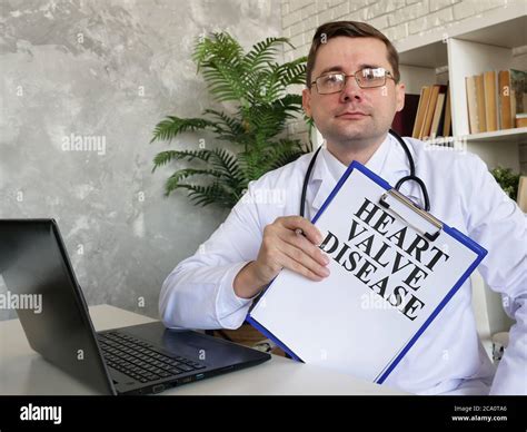 Heart valve disease concept. Doctor shows diagnosis Stock Photo - Alamy