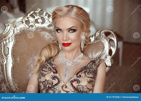 Fashion Indoor Portrait Of Beautiful Sensual Blond Woman With Ma Stock