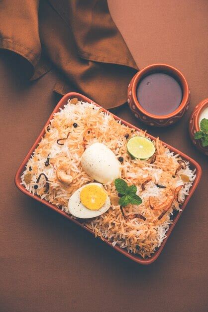 Premium Photo Egg Biryani Basmati Rice Cooked With Masala Roasted