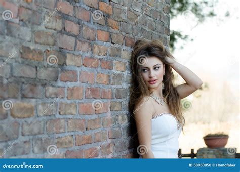 Fashion Woman Leaning Against Brick Wall Stock Photo Image Of Eyes