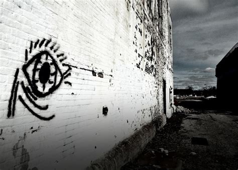 Premium Photo | Eye graffiti on wall