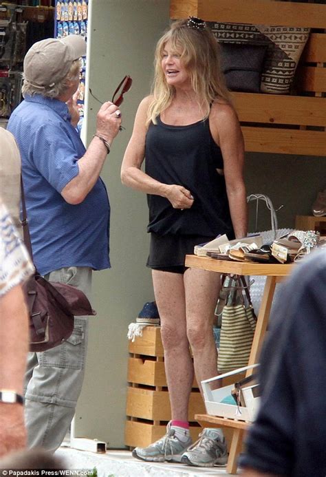 Goldie Hawn Sports Black Mini Skirt For Shopping Spree In Greece