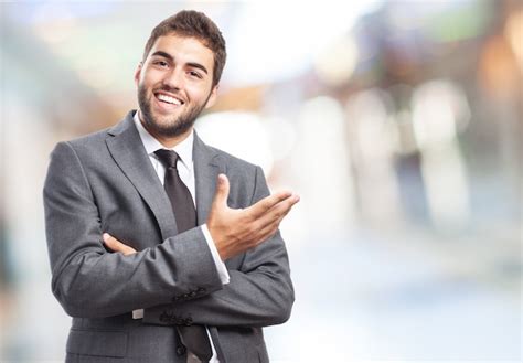 Hombre De Negocios Feliz Haciendo Gestos Descargar Fotos Gratis