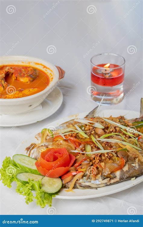 Steamed Pompano Or Kuwe Fish With Sweet And Spicy Sauce Stock Image