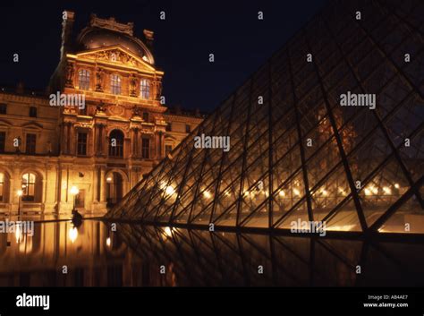 France Paris Louvre at night Stock Photo - Alamy