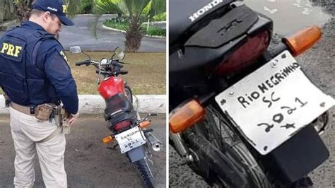 Homem tem moto apreendida após improvisar e colocar placa pintada a mão