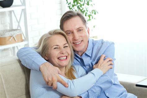 Happy Couple in Love Hug Each Other on Bed at Home Stock Image - Image ...