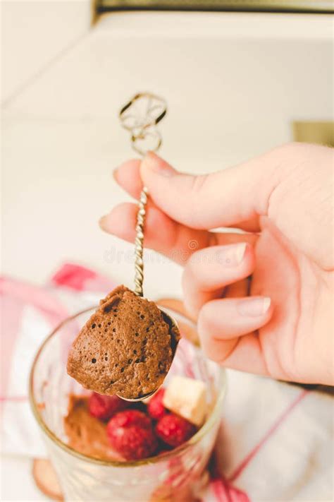 Chocolate Chia Pudding In Portion Glasses On A White Marble Table