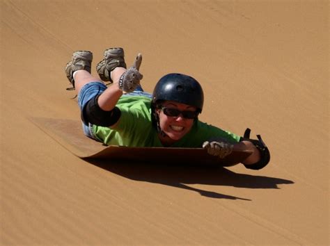 Thrilling Sand Sledding Experience In Namibia