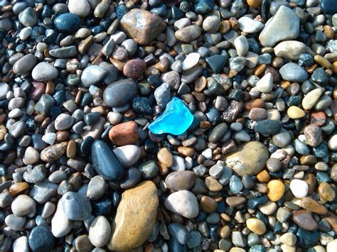 Brilliant Blue Beach Glass Is Striking In These Beach Stones Blue Beach Beach Fun Sea Glass