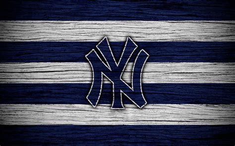 Download Iconic New York Yankees Logo Against Stadium Crowd Wallpaper