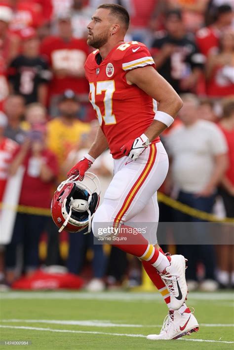 Travis Kelce of the Kansas City Chiefs warms-up before the game... in ...