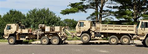 M1089A1P2 MTV Wrecker and a M1157 MTV Dump Truck on the ho… | Flickr