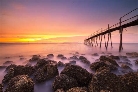 Sunrise on beach stock photo. Image of cloud, sunrise - 41521332