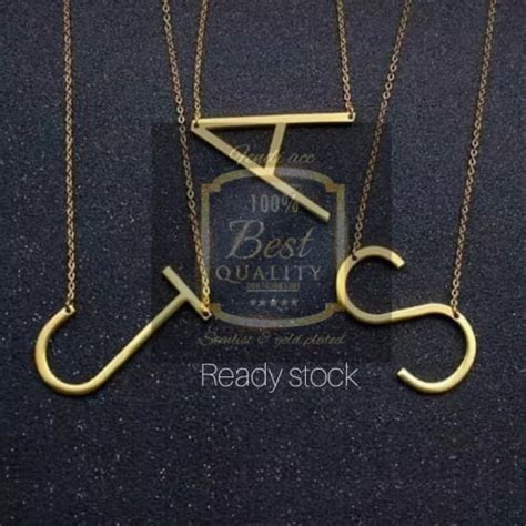 Kalung Nama Inisial Satu Trik