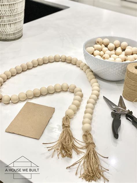 How To Make A Wood Bead Garland Decor Diy Wood Bead Garland Wood